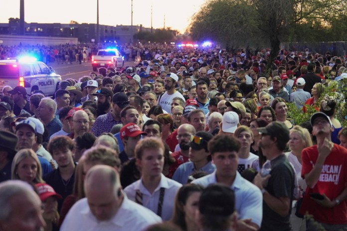 Massive crowds and heavy security as Charlie Kirk memorial begins in Arizona