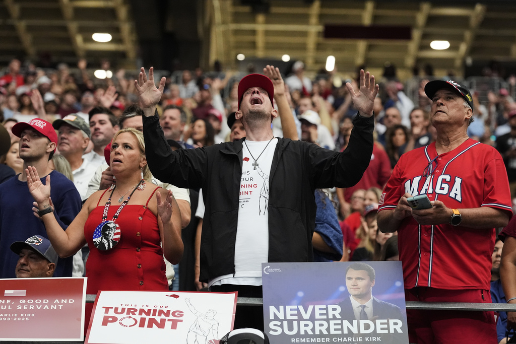 NextImg:Mourners remember Charlie Kirk with messages of faith, freedom, and family