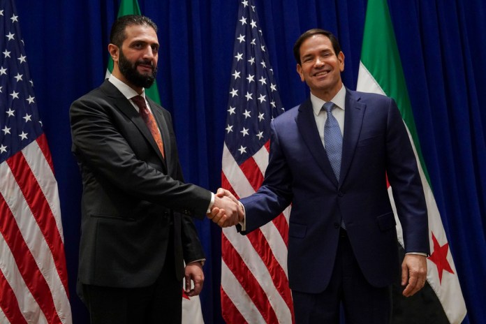 Secretary of State Marco Rubio shakes hands with Syrian interim President Ahmad al-Sharaa at the Lotte New York Palace Hotel, on the sidelines of the 80th United Nations General Assembly at the United Nations headquarters, Monday, Sept. 22, 2025.