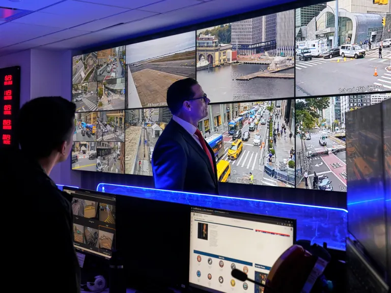 Secret Service Special Agent in Charge Matt McCool looks at surveillance footage.