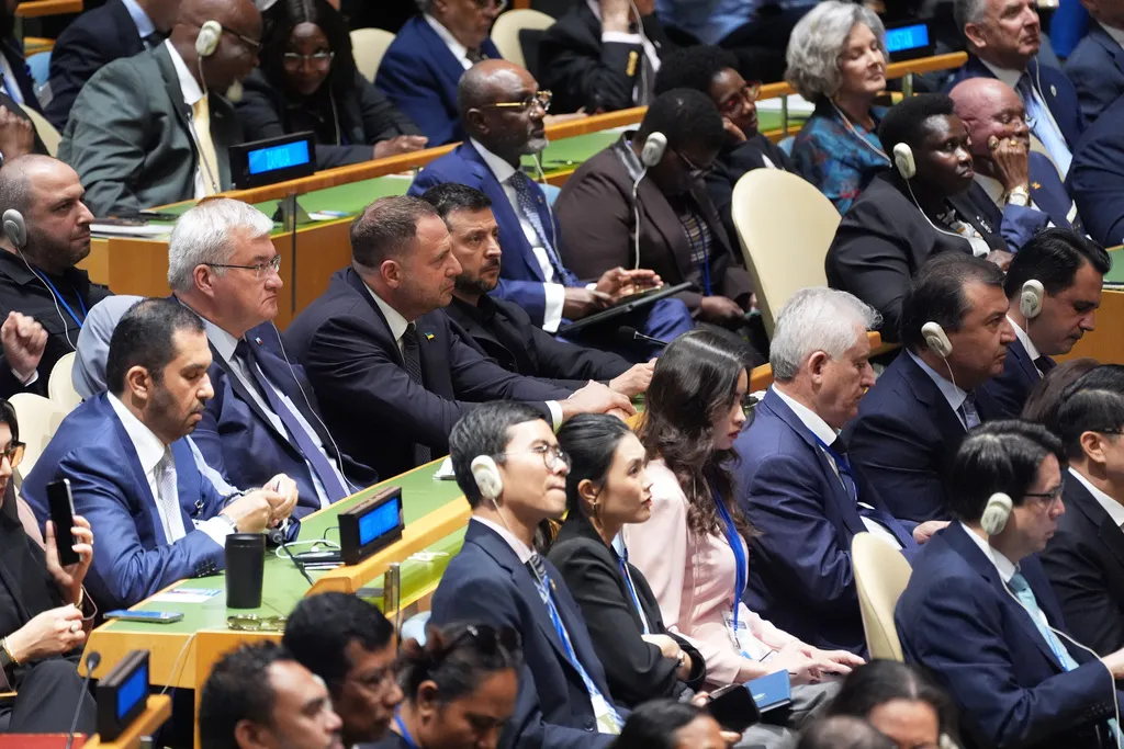 Ukrainian President Volodymyr Zelensky and other representatives sit in the crowd at the United Nations General Assembly.