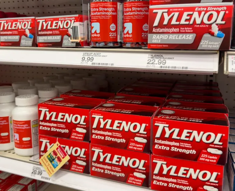 Tylenol pain relief products are shown on a store shelf.