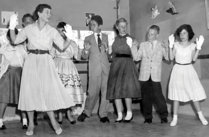 Instruction in dance and social graces in Kings Park, New York, 1957. (AP Images)