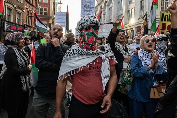 People protest against Israel at the Israeli Embassy on August 22, 2025 in London, England. (Guy Smallman/Getty Images)