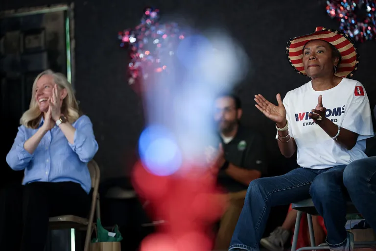 Virginia Republican gubernatorial candidate, Lt. Gov. Winsome Earle-Sears (R), and Virginia Democratic gubernatorial candidate, former Rep. Abigail Spanberger (L), wait to speak at the 54th Annual Buena Vista Labor Day Festival on September 01, 2025 in Buena Vista, Virginia. The Commonwealth of Virginia will hold its off-year election for governor and other statewide offices on November 4. (Photo by Win McNamee/Getty Images)