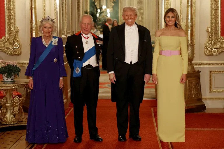 From left, Britain's Queen Camilla, King Charles, President Donald Trump and First Lady Melania Trump arrive for a State Banquet at Windsor Castle, in Windsor, England, Sept. 17, 2025. (Phil Noble/Pool Photo via AP)