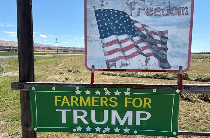 Modoc County, in California’s northeast corner, is a Republican stronghold. Local ranchers express enthusiasm for the policies of President Donald Trump, in a sign along California State Route 139. (Photo by David Mark)
