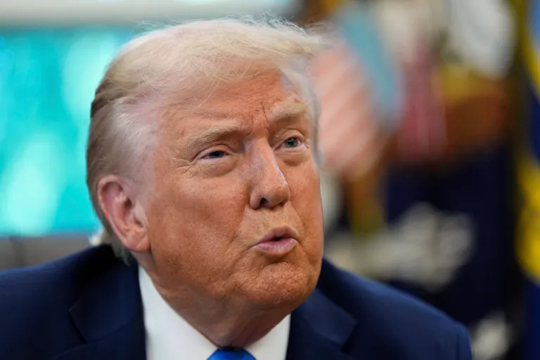President Donald Trump speaks in the Oval Office.