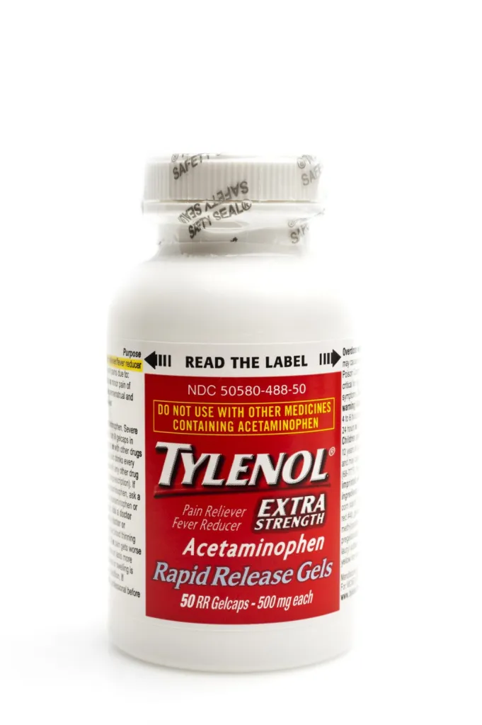 Miami, Florida- January, 16 2009: Brand new Bottle containing 50 gel capsules of Extra Strength Tylenol (Acetaminophen) on white background. Paracetamol or acetaminophen is a widely used over-the-counter analgesic (pain reliever) and antipyretic (fever reducer). It is commonly used for the relief of headaches, other minor aches and pains.