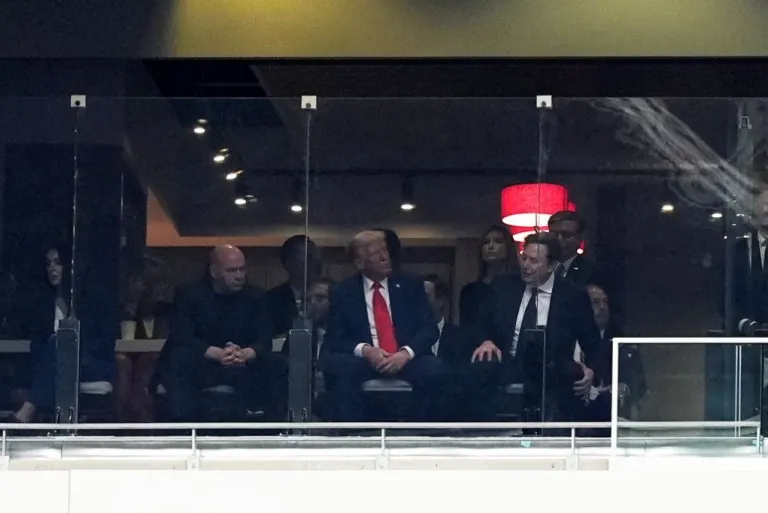 President Donald Trump speaks with Dana White and Elon Musk.