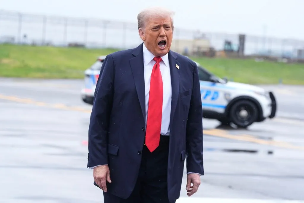 NextImg:'We're not going to war' with Chicago, Trump says after meme post