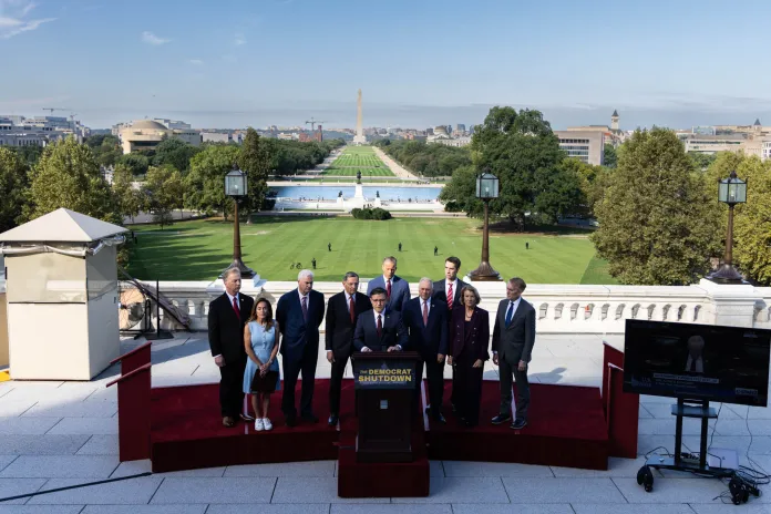 House and Senate Republicans stand on the West Terrace of the U.S. Capitol on Oct. 1, 2025, on the first day of the government shutdown. (Washington Examiner/Graeme Jennings)