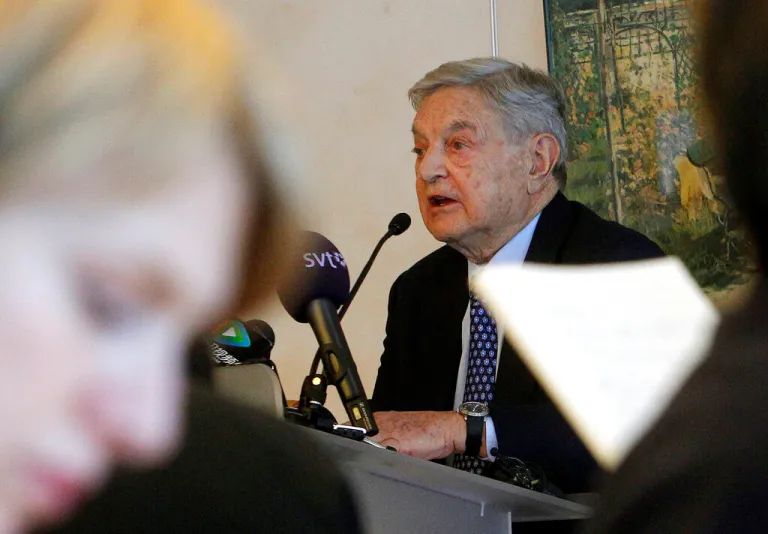 Georges Soros of the Soros Fondation, speaks to the media at the World Economic Forum in Davos, Switzerland, Wednesday, Jan. 25, 2012. The overarching theme of the meeting, which will take place from Jan. 25 to 29, is 