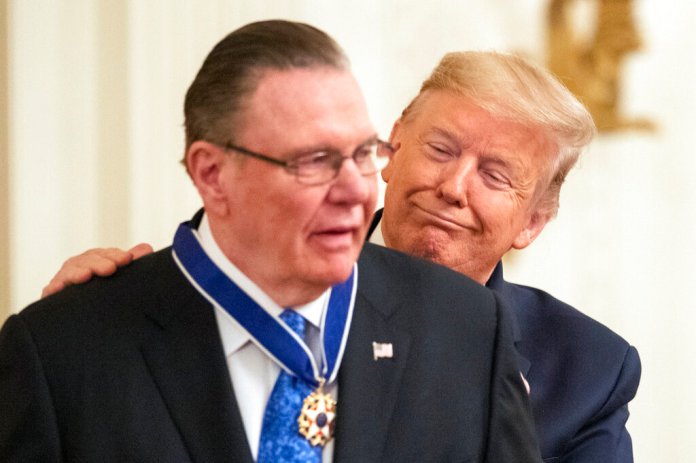 President Donald Trump presents the Presidential Medal of Freedom to former Vice Chief of Staff Army Gen. Jack Keane in the East Room of the White House in Washington, Tuesday, March 10, 2020. (AP Photo/Manuel Balce Ceneta)