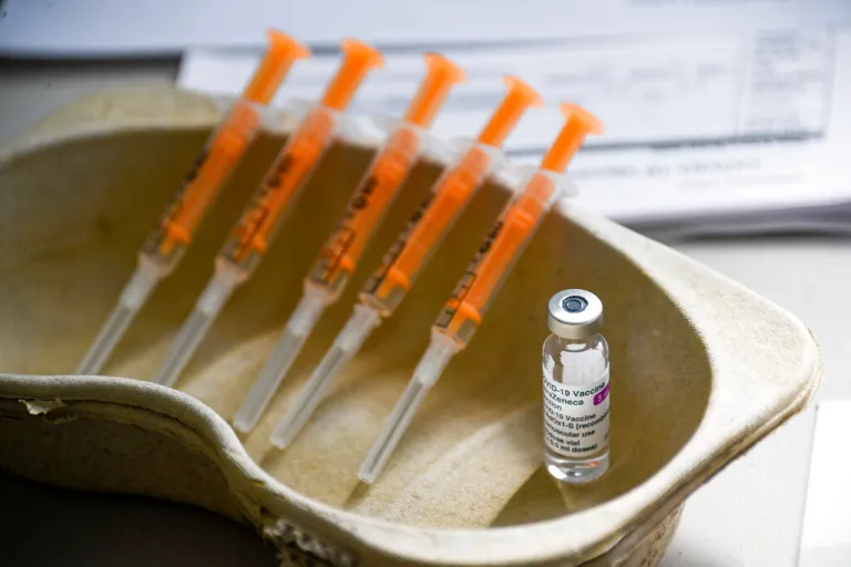 A vial and syringes of the AstraZeneca COVID-19 vaccine.
