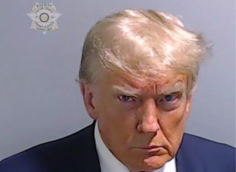 This booking photo provided by the Fulton County Sheriff’s Office shows former President Donald Trump on Thursday, Aug. 24, 2023, after he surrendered and was booked at the Fulton County Jail in Atlanta. Trump is accused by Fulton County District Attorney Fani Willis of attempting to subvert the will of Georgia voters in a bid to keep Joe Biden out of the White House.