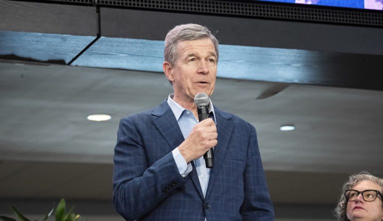 Governor Roy Cooper speaks during a press conference for Concert for Carolina on Saturday, Oct. 26, 2024, in Charlotte, N.C.