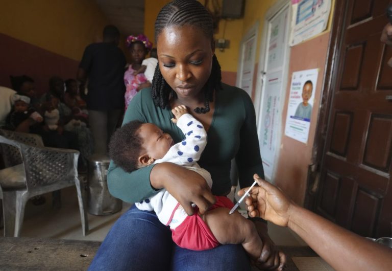 A health worker administers the malaria vaccine R21/Matrix-M to a child at the comprehensive Health Centre in Agudama-Epie, in Yenagoa, Nigeria, Monday, Dec. 9, 2024.