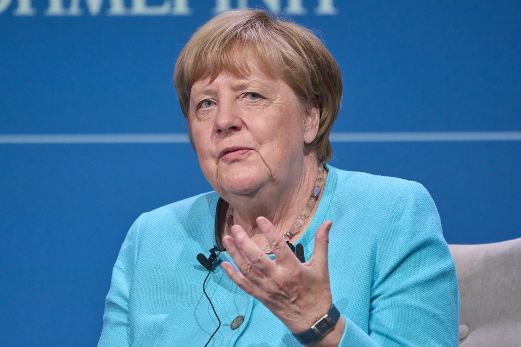 NextImg:Merkel praises Orban, takes digs at Poland and the Baltics in book tour interview