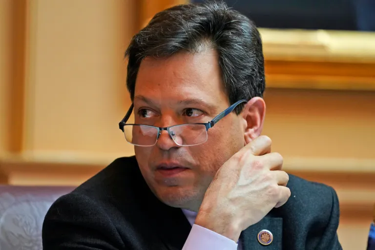 FILE - Virginia state Sen. Scott Surovell, D-Fairfax, listens to debate during the Senate session at the Capitol, March 10, 2022, in Richmond, Va. (AP Photo/Steve Helber, File)