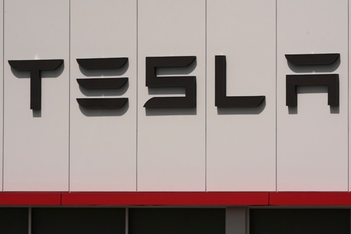 Tesla reports record sales increase as EV subsidies expire