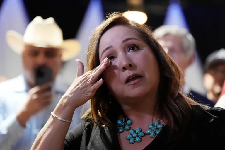 Arizona Democratic candidate Adelita Grijalva wipes a tear.
