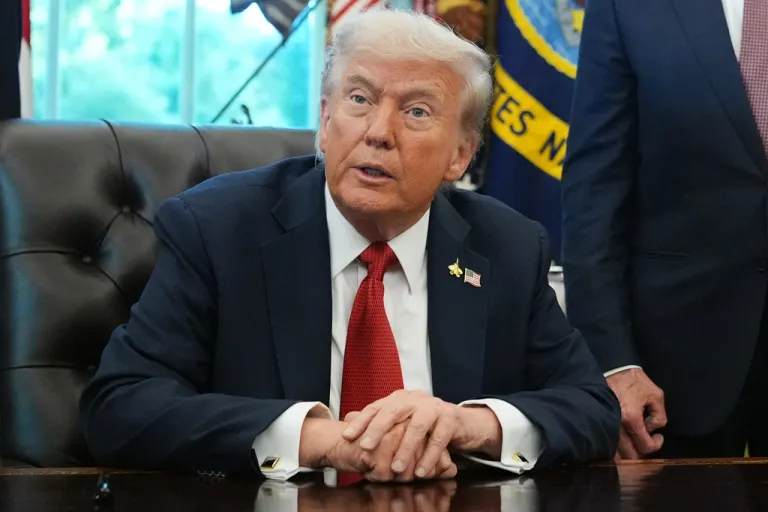 President Donald Trump speaks to reporters.