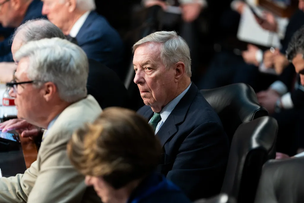 Senate Judiciary Committee ranking member Dick Durbin (D-IL) listens to Sen. Sheldon Whitehouse (D-RI) speak at an oversight hearing