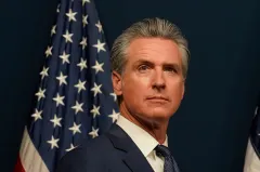 Newsom signs literacy bill, says scores improve