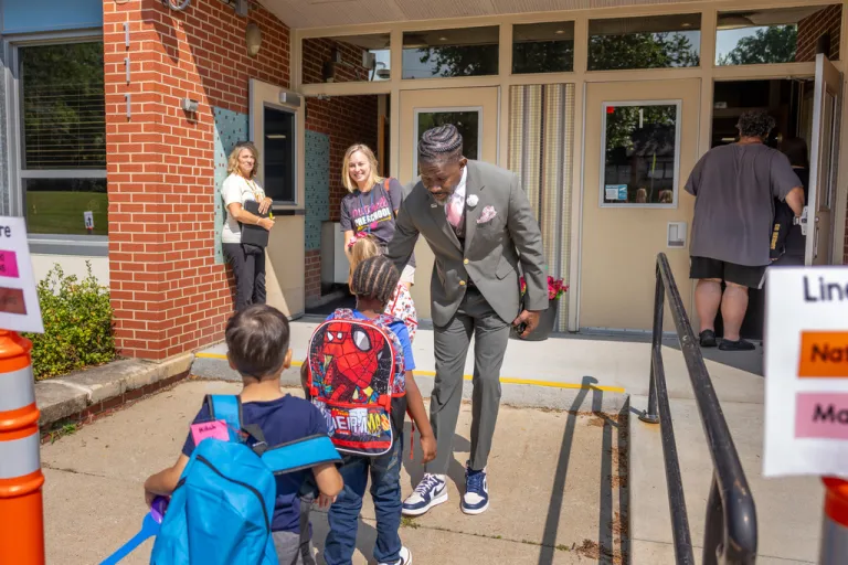 Iowa Senate candidate drops bid to focus on school board after superintendent was arrested by ICE Ian Roberts, superintendent of Des Moines Public Schools, greets students