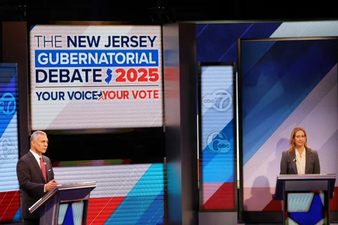 Republican Jack Ciattarelli, left, and Democrat Mikie Sherrill participate in the final debate in the New Jersey governor's race, Wednesday, Oct. 8, 2025, in New Brunswick, N.J.