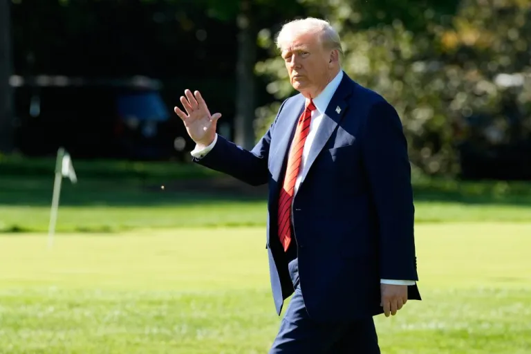 President Donald Trump walks to board Marine One on the South Lawn of the White House.