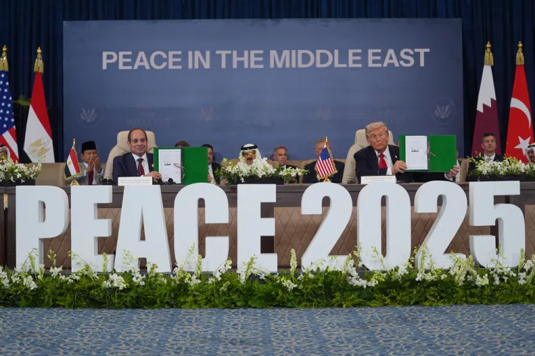 President Donald Trump and Egypt's President Abdel-Fattah el-Sissi hold signed documents during a summit to support ending the more than two-year Israel-Hamas war in Gaza after a breakthrough ceasefire deal, Monday, Oct. 13, 2025, in Sharm El Sheikh, Egypt.