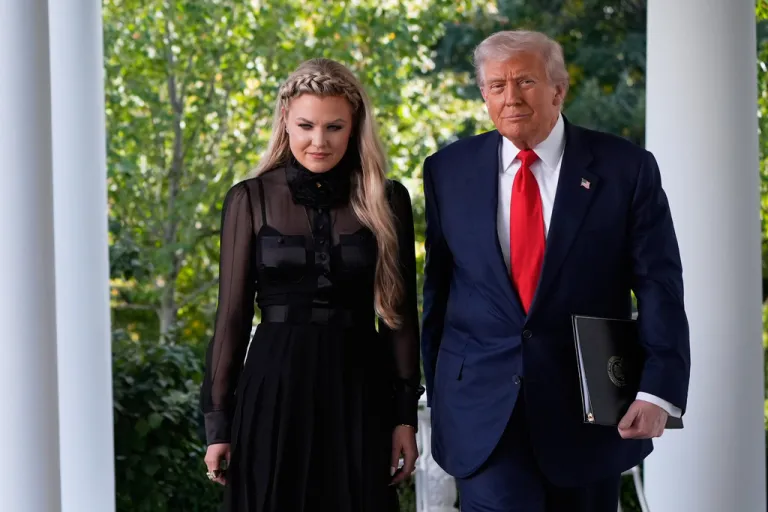 President Donald Trump, with Erika Kirk.