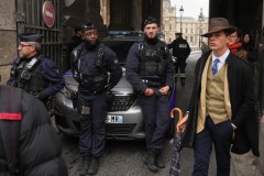 Inspector Clouseau? The mystery man in an AP photo after the Louvre jewel heist creates a buzz