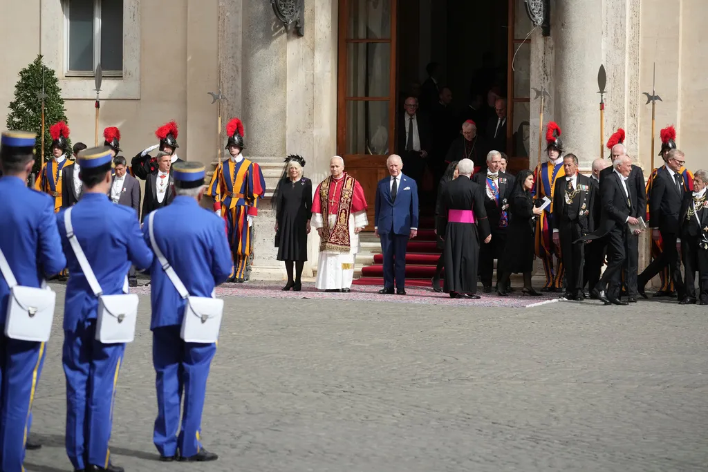 King Charles stand with Pope Leo in the St Damascus Courtyard.