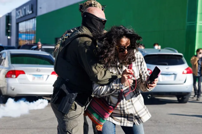 Federal immigration enforcement agents detain a protester in Little Village neighborhood, Chicago Thursday, Oct. 23, 2025. (Anthony Vazquez /Chicago Sun-Times via AP)