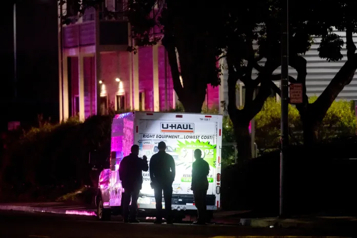 Officers shoot truck driver who backed into Coast Guard base