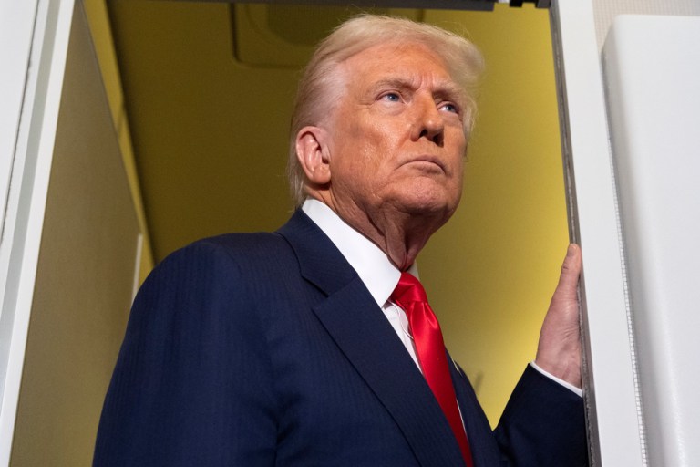 President Donald Trump speaks with reporters aboard Air Force One shortly after taking off from Busan, South Korea, en route to Joint Base Andrews, Md., Thursday, Oct. 30, 2025. (AP Photo/Mark Schiefelbein)