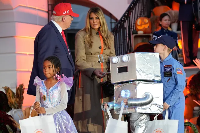 President Donald Trump and first lady Melania Trump participate in a Halloween event