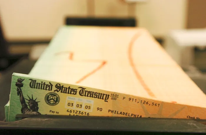 FILE - In this Feb. 11, 2005 file photo, trays of printed social security checks wait to be mailed from the U.S. Treasury's Financial Management services facility in Philadelphia.