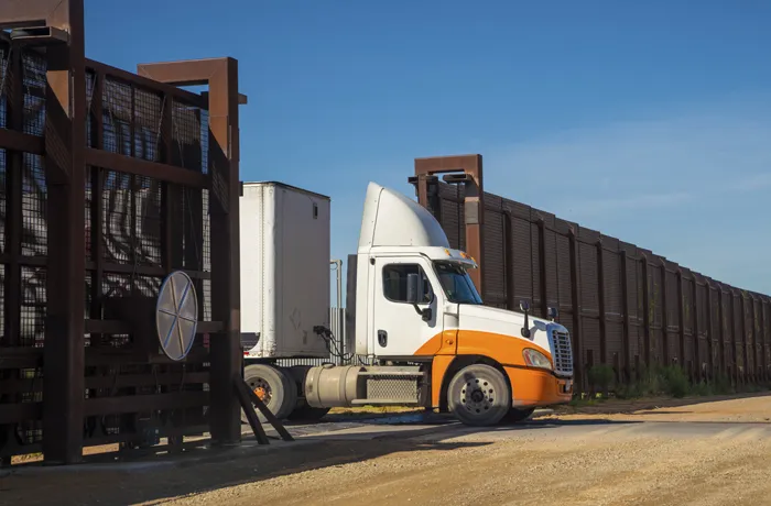 Semi-truck awaiting inspection at the US-Mexico border crossing
