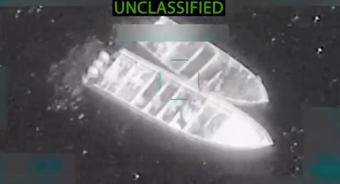 A declassified image of a U.S. strike on an alleged Venezuelan drug boat.