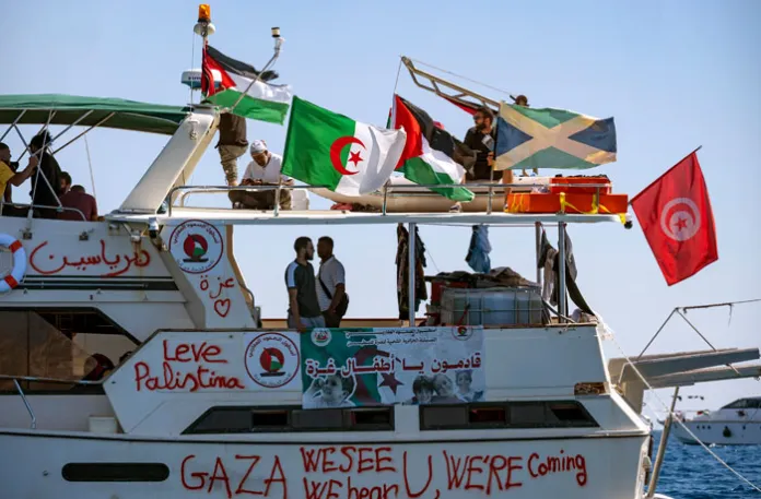 Members of the group of ships of the Global Sumud Flotilla to Gaza are seen moored at the island of Koufonisi, south of the island of Crete, on Sept. 26, 2025. (Eleftherios ELIS/AFP/Getty)