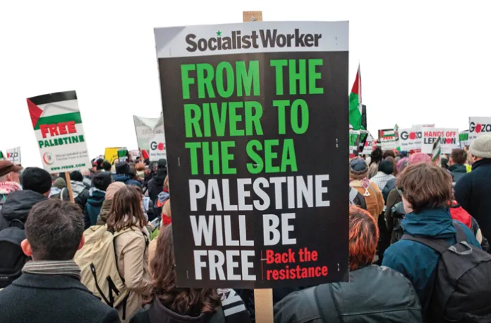 Pro-Palestinian activists attend a Rally for Palestine in Parliament Square on 14th December 2024 in London, U.K. (Mark Kerrison/In Pictures via Getty Images)