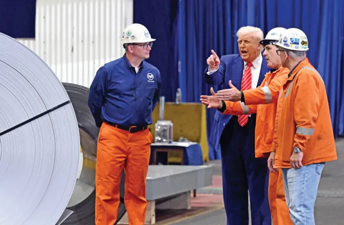 President Donald Trump speaks with workers at the U.S. Steel plant in West Mifflin, Pennsylvania, May 30, 2025. (Saul Loeb/AFP/Getty)