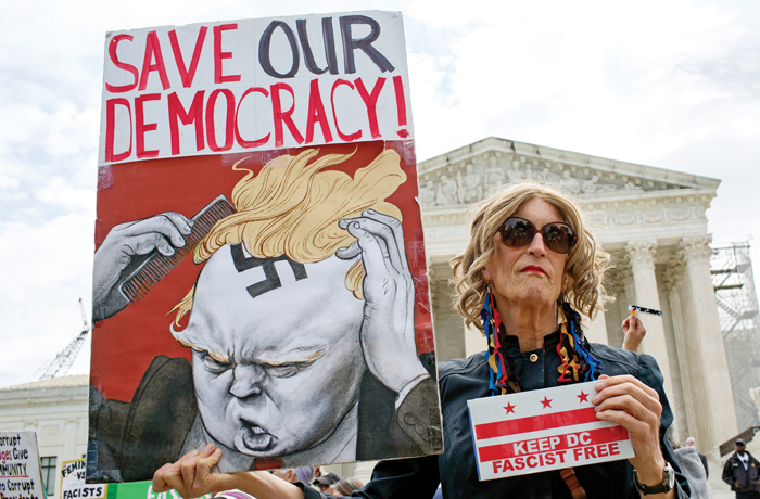 A protester outside the Supreme Court in Washington, D.C., April 25, 2025. (Plexi Images/GHI/UCG/Universal Images Group/Getty)