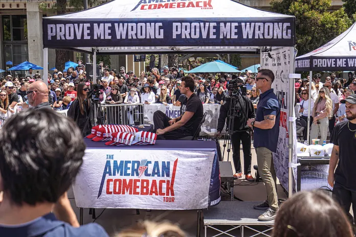 Hundreds of people gather at Town Square in UC San Diego while Charlie Kirk sits in the middle of the plaza. Turning Point USA founder and American conservative political activist, Charlie Kirk sets up in UC San Diego's Town Square fielding rapid-fire questions from students and community members in a signature "change-my-mind"-style forum, while campus police and private security ring the perimeter to keep the busy plaza orderly. (Photo by Michael Ho Wai Lee/SOPA Images/LightRocket via Getty Images)