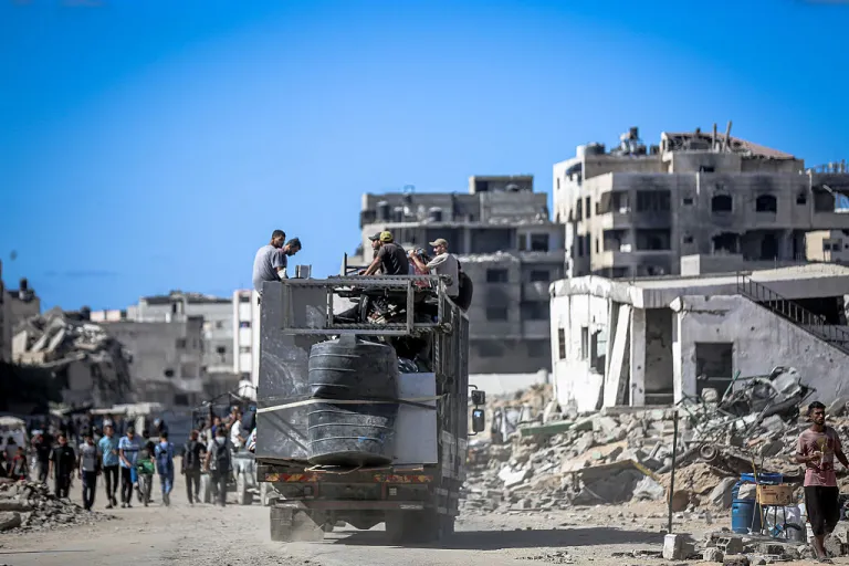 Palestinians continue to flee their homes in the northern Gaza Strip following intensified Israeli attacks, moving with vehicles, horse carts, and on foot along Al-Rashid Street towards the central areas of Gaza, carrying whatever belongings they could take, on October 1, 2025. (Photo by Saeed M. M. T. Jaras/Anadolu via Getty Images)