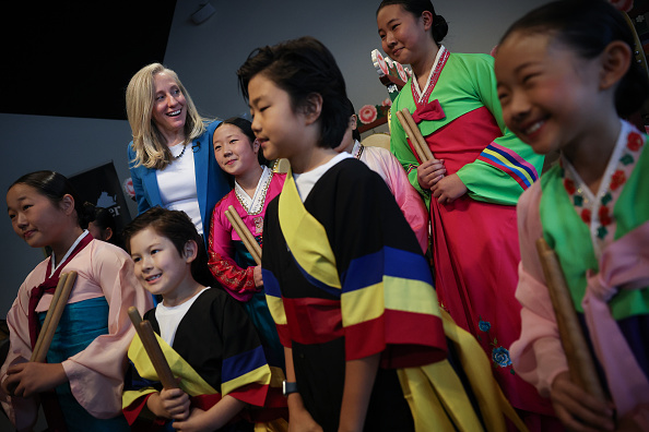 Virginia Democratic gubernatorial candidate, former Rep. Abigail Spanberger greets children who performed a Korean drumming ceremony during a campaign event at Soricha Tea & Theater on October 30, 2025 in Annandale, Virginia. Spanberger will face off against Republican candidate Winsome Earle-Sears in the Commonwealth of Virginia’s off-year election for governor and other statewide offices on November 4.